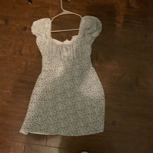 Floral white and blue mini dress bought at PacSun by the brand La hearts